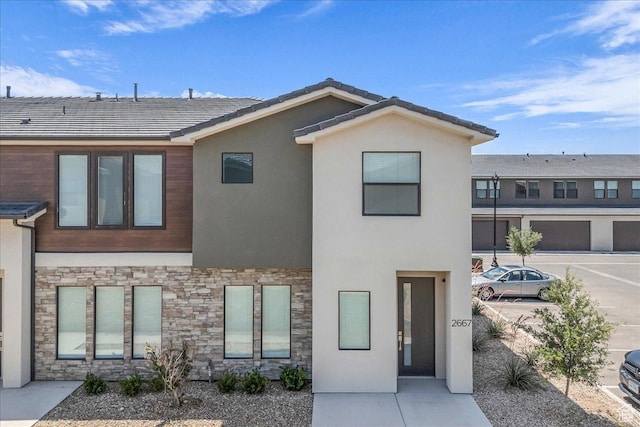 2667 E Wake Ln, St George, UT 84790 - view of front facade with stone siding and stucco siding