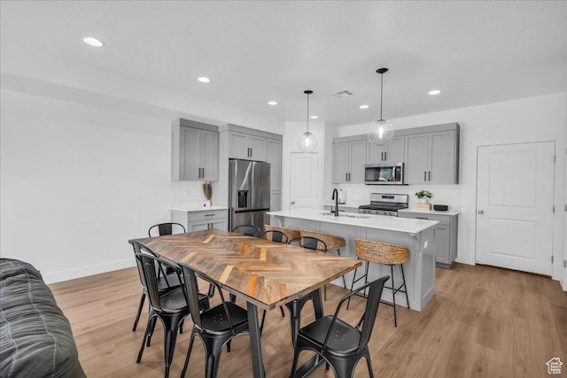 2667 E Wake Ln, St George, UT 84790 - dining area with light wood finished floors, baseboards, and recessed lighting