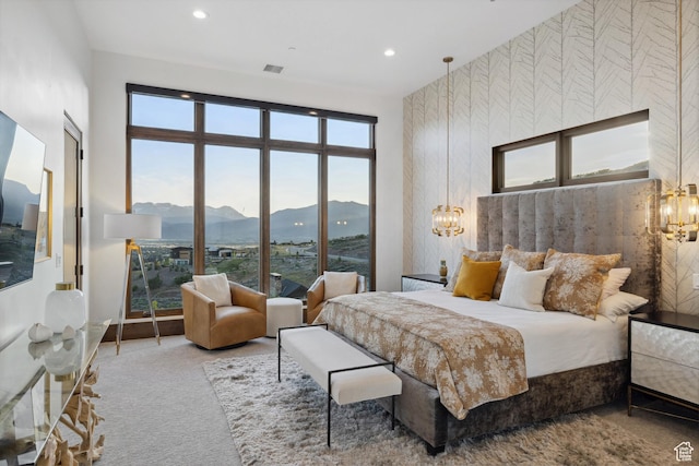 1703 N Chimney Rock Rd Unit 532, Heber City, UT 84032 - bedroom featuring a mountain view, carpet flooring, multiple windows, recessed lighting, and a chandelier