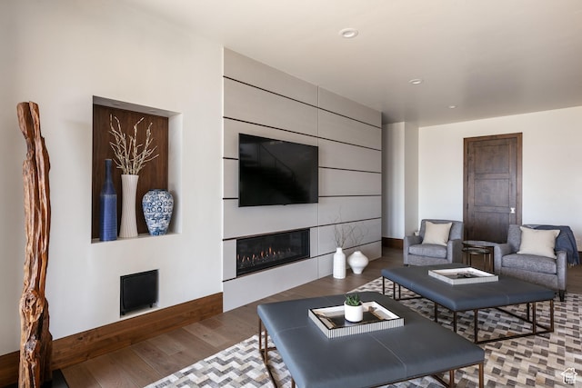 1703 N Chimney Rock Rd Unit 532, Heber City, UT 84032 - living room featuring wood finished floors, recessed lighting, a glass covered fireplace, and baseboards