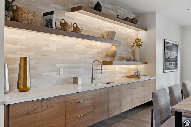 1703 N Chimney Rock Rd Unit 532, Heber City, UT 84032 - bar featuring tasteful backsplash, a sink, and dark wood-type flooring