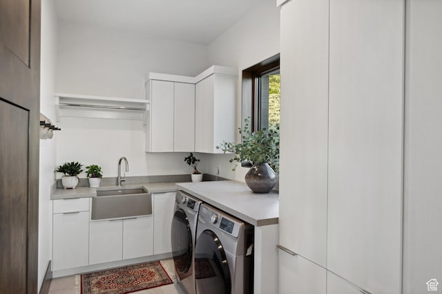1703 N Chimney Rock Rd Unit 532, Heber City, UT 84032 - laundry room with washer and clothes dryer and cabinet space