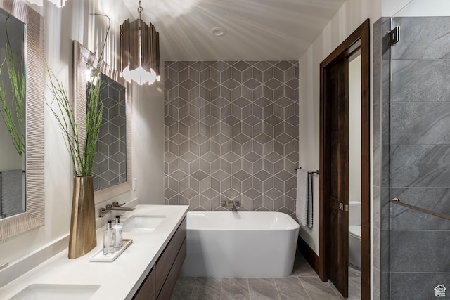 1703 N Chimney Rock Rd Unit 532, Heber City, UT 84032 - bathroom featuring a freestanding bath, double vanity, and toilet