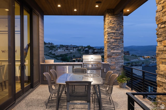 1703 N Chimney Rock Rd Unit 532, Heber City, UT 84032 - view of patio with a grill, a balcony, and a mountain view