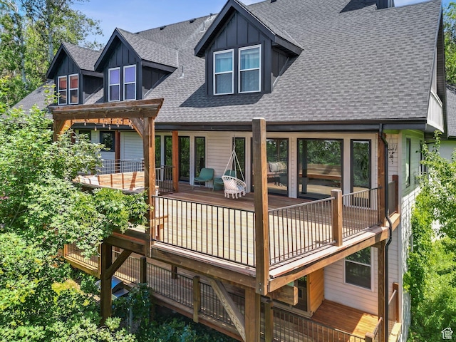 2692 S Grand Oak Cir E, Bountiful, UT 84010 - back of house featuring a shingled roof, board and batten siding, and a deck