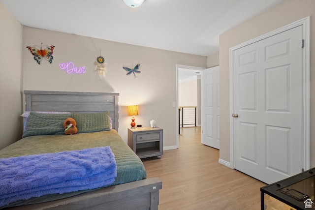 2692 S Grand Oak Cir E, Bountiful, UT 84010 - bedroom with light wood-type flooring and baseboards