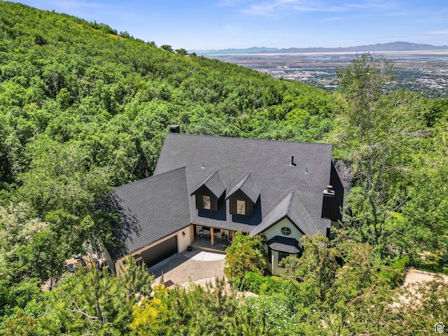 2692 S Grand Oak Cir E, Bountiful, UT 84010 - view from above of property with a forest and a mountainous background