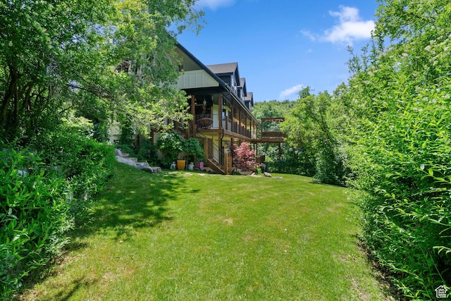 2692 S Grand Oak Cir E, Bountiful, UT 84010 - view of grassy yard with stairway and a wooden deck
