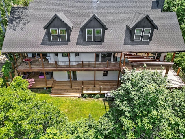 2692 S Grand Oak Cir E, Bountiful, UT 84010 - back of house featuring a shingled roof, a yard, a balcony, and a wooden deck