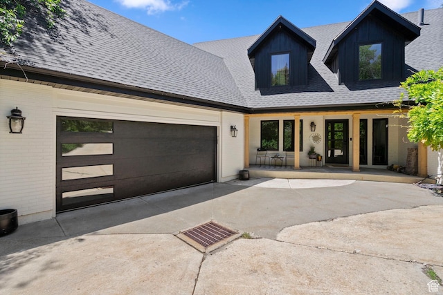 2692 S Grand Oak Cir E, Bountiful, UT 84010 - modern farmhouse featuring driveway, a shingled roof, an attached garage, and brick siding