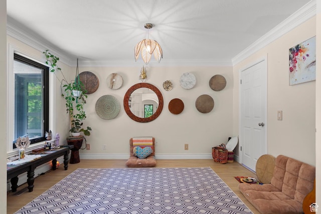 2692 S Grand Oak Cir E, Bountiful, UT 84010 - living area featuring wood finished floors, ornamental molding, and baseboards