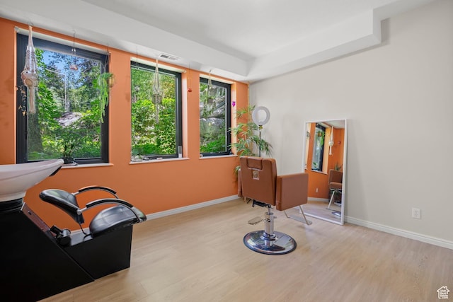 2692 S Grand Oak Cir E, Bountiful, UT 84010 - living area with wood finished floors, baseboards, and a raised ceiling