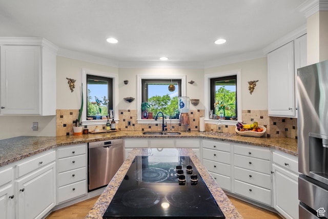 2692 S Grand Oak Cir E, Bountiful, UT 84010 - kitchen featuring stainless steel appliances, a sink, backsplash, white cabinets, and recessed lighting