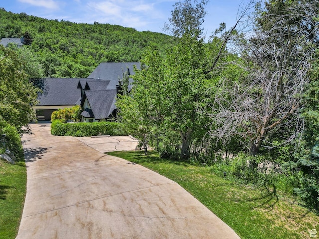2692 S Grand Oak Cir E, Bountiful, UT 84010 - view from above of property with a heavily wooded area
