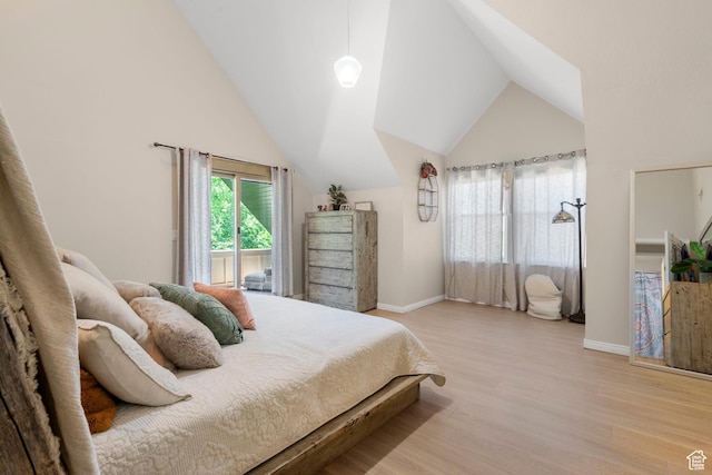2692 S Grand Oak Cir E, Bountiful, UT 84010 - bedroom with light wood-style flooring, baseboards, and lofted ceiling
