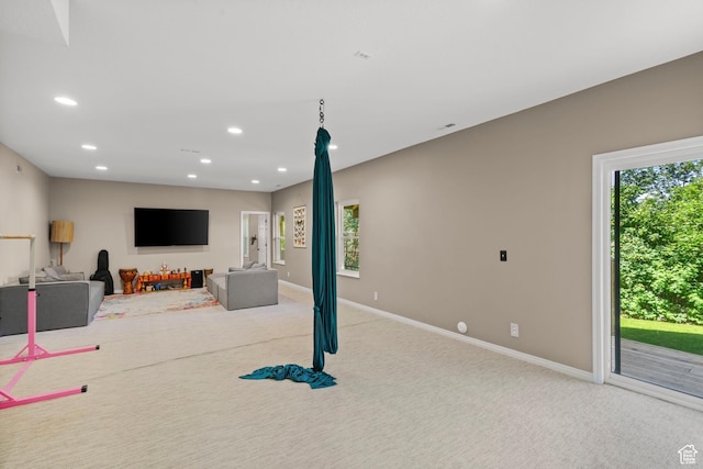 2692 S Grand Oak Cir E, Bountiful, UT 84010 - unfurnished living room with recessed lighting, healthy amount of natural light, carpet floors, and baseboards