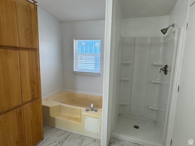 6153 E 2000 N, Roosevelt, UT 84066 - bathroom featuring a textured ceiling, marble finish floors, a bath, and a shower