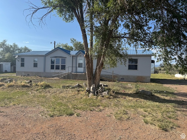 6153 E 2000 N, Roosevelt, UT 84066 - back of house featuring crawl space and metal roof