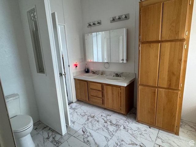 6153 E 2000 N, Roosevelt, UT 84066 - full bathroom featuring marble look tiles, toilet, and double vanity