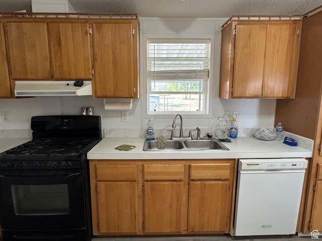 6153 E 2000 N, Roosevelt, UT 84066 - kitchen with black gas stove, white dishwasher, under cabinet range hood, a sink, and light countertops