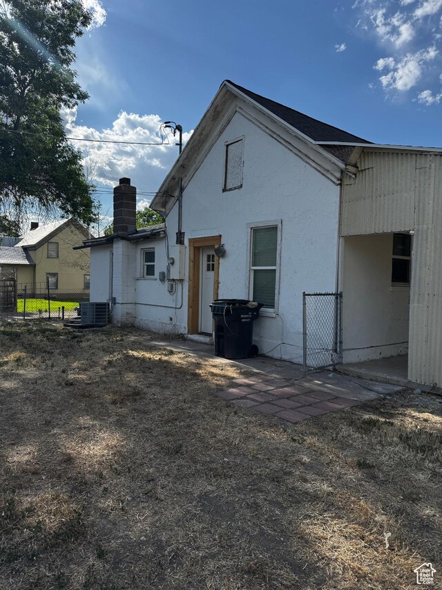 188 E 100 N, Nephi, UT 84648 - back of property with a chimney and stucco siding