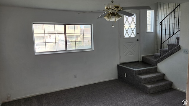 1896 W Homestead Farms Ln Unit 3, Salt Lake City, UT 84119 - carpeted foyer entrance featuring a ceiling fan, stairway, and baseboards