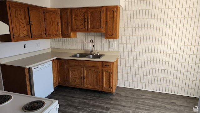 1896 W Homestead Farms Ln Unit 3, Salt Lake City, UT 84119 - kitchen featuring a sink, white appliances, brown cabinets, and light countertops