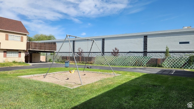 1896 W Homestead Farms Ln Unit 3, Salt Lake City, UT 84119 - communal playground featuring a lawn