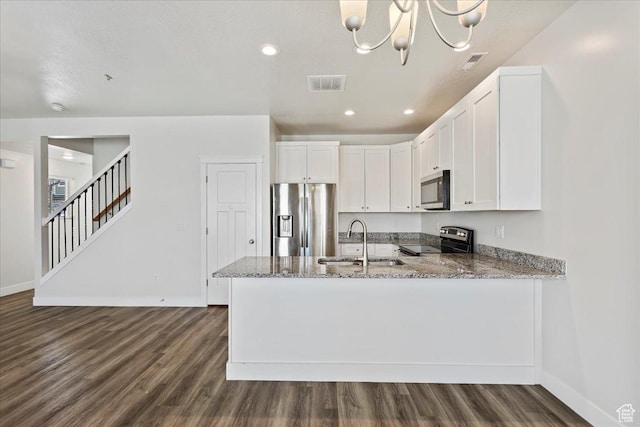290 N 100 W, Morgan, UT 84050 - kitchen with appliances with stainless steel finishes, a sink, baseboards, and recessed lighting