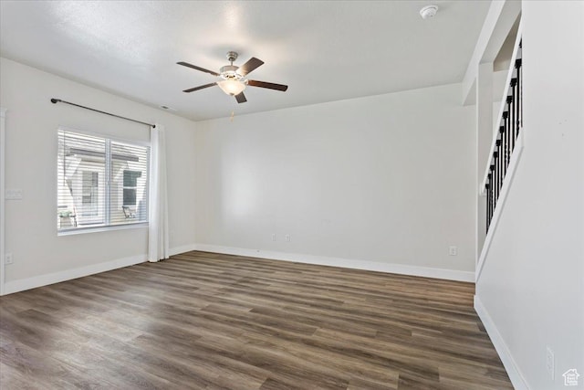 290 N 100 W, Morgan, UT 84050 - spare room with ceiling fan, dark wood-style floors, and baseboards