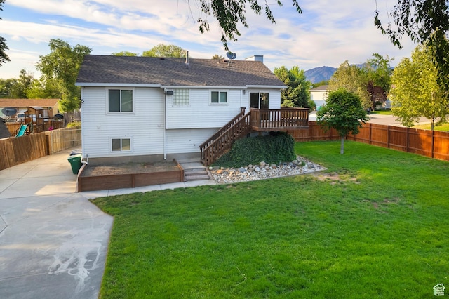 1022 E Lafayette St S, Sandy, UT 84094 - back of property with a deck with mountain view, a shingled roof, a chimney, and stairway