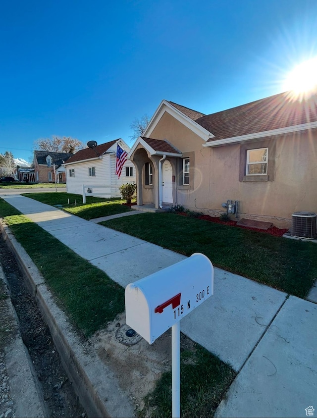 115 N 300 E, Payson, UT 84651 - ranch-style home with stucco siding and a front lawn