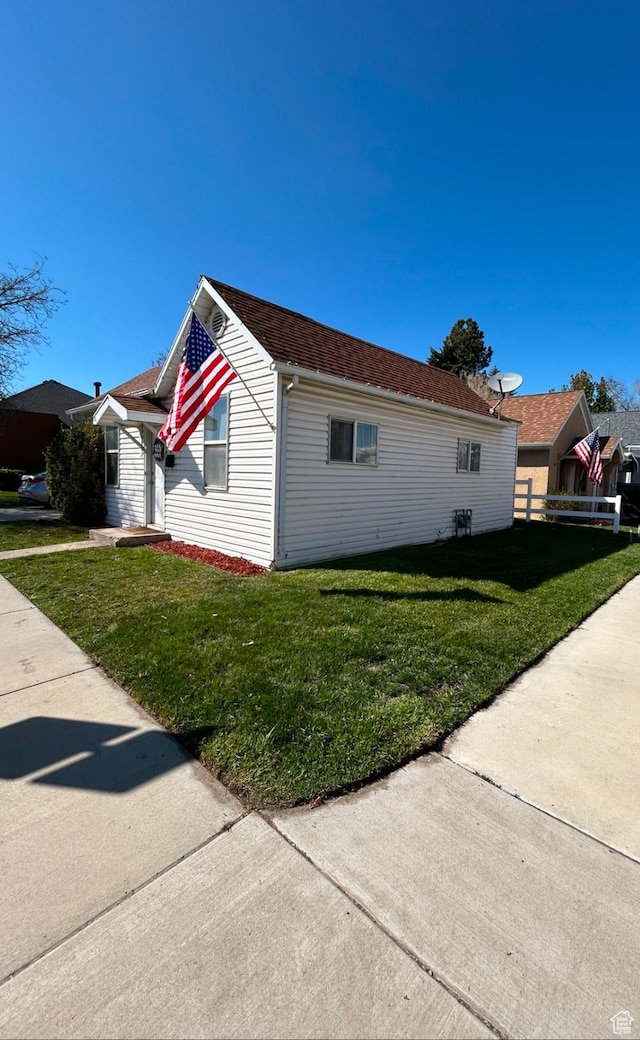 115 N 300 E, Payson, UT 84651 - view of side of home featuring a lawn and roof with shingles