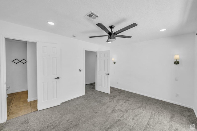 2158 W 70 S, Hurricane, UT 84737 - unfurnished bedroom featuring carpet, recessed lighting, a textured ceiling, and baseboards