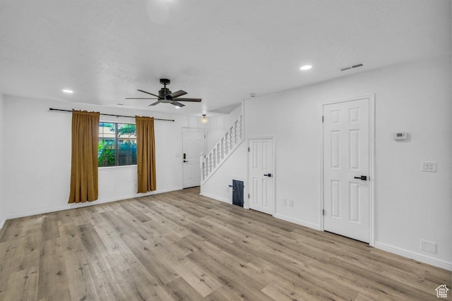 2158 W 70 S, Hurricane, UT 84737 - unfurnished living room featuring stairway, ceiling fan, wood finished floors, recessed lighting, and baseboards