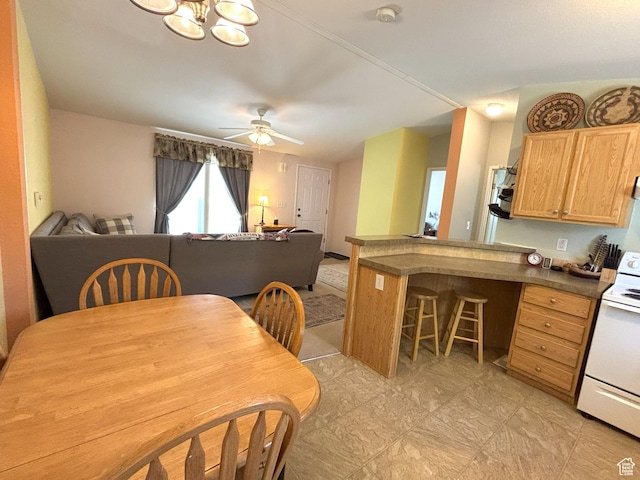 380 Portal Vista Loop, Moab, UT 84532 - dining room with a ceiling fan and a chandelier
