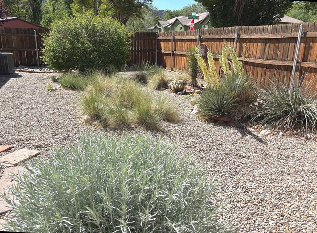 380 Portal Vista Loop, Moab, UT 84532 - fenced backyard featuring central AC