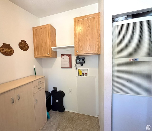 380 Portal Vista Loop, Moab, UT 84532 - laundry room featuring a heating unit, washer hookup, and baseboards