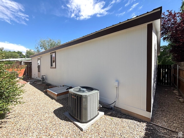 380 Portal Vista Loop, Moab, UT 84532 - view of side of property with central air condition unit