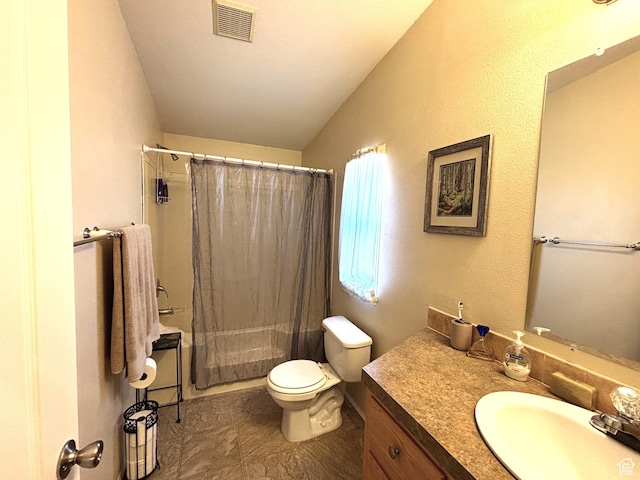 380 Portal Vista Loop, Moab, UT 84532 - bathroom featuring vanity, lofted ceiling, toilet, and shower / bath combo with shower curtain