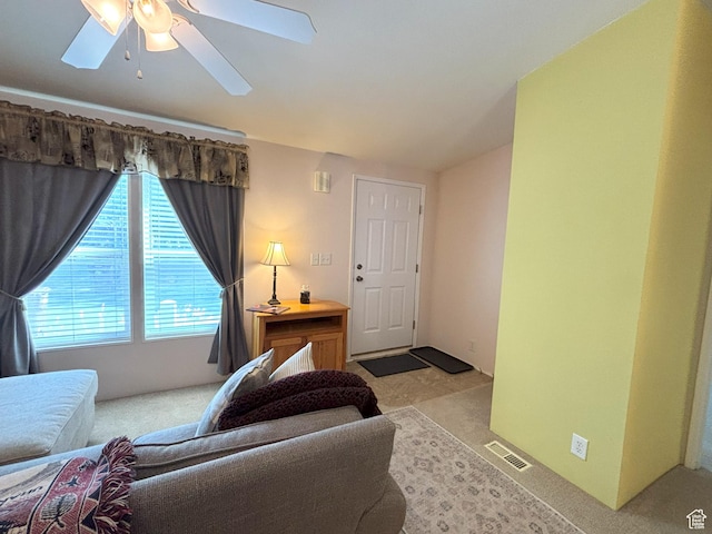 380 Portal Vista Loop, Moab, UT 84532 - living room with a ceiling fan and light carpet