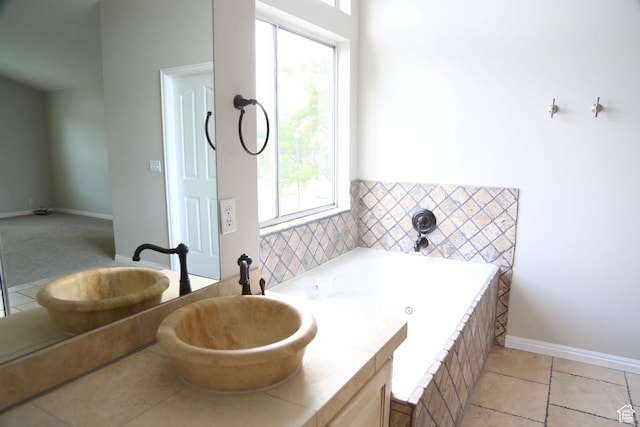 760 E Corner Ridge Dr, Draper, UT 84020 - bathroom with a whirlpool tub, a sink, and baseboards
