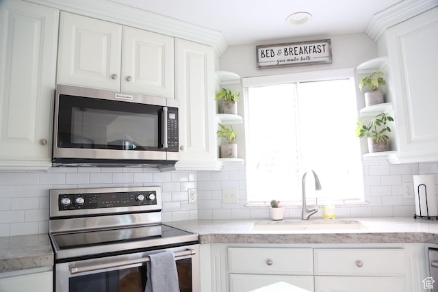 760 E Corner Ridge Dr, Draper, UT 84020 - kitchen with open shelves, appliances with stainless steel finishes, a sink, and white cabinets