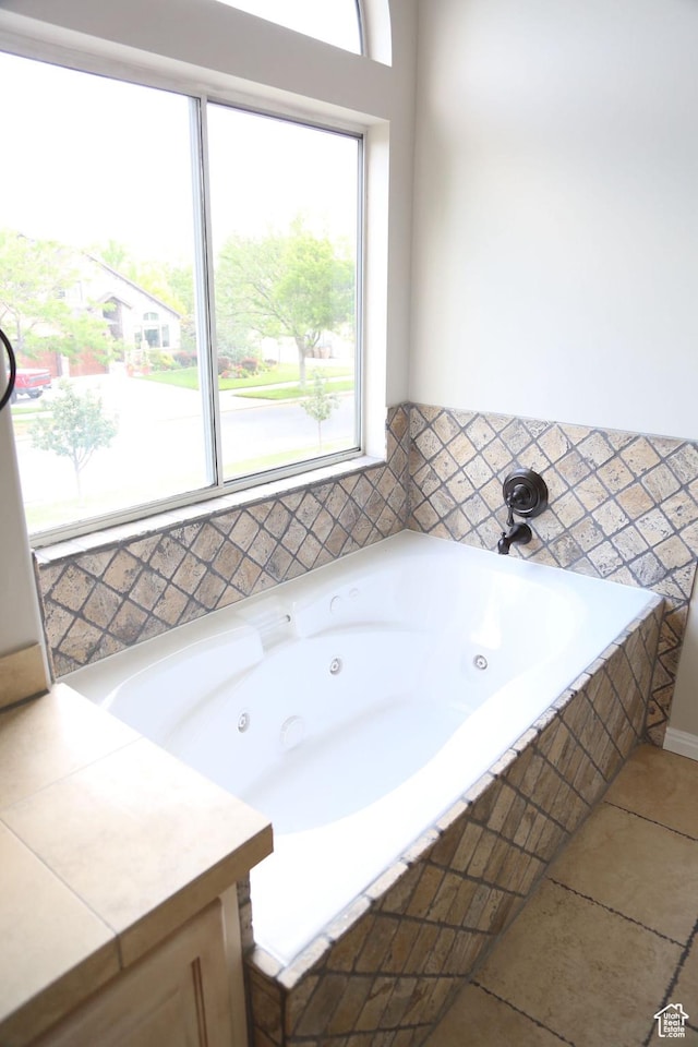 760 E Corner Ridge Dr, Draper, UT 84020 - bathroom with a whirlpool tub, healthy amount of natural light, and tile patterned floors