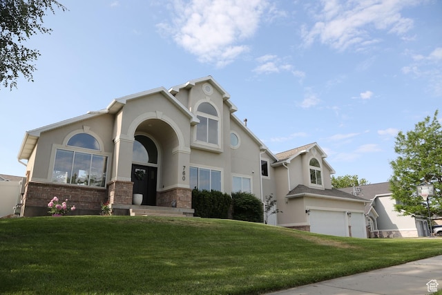 760 E Corner Ridge Dr, Draper, UT 84020 - view of front of home featuring stucco siding and a front yard