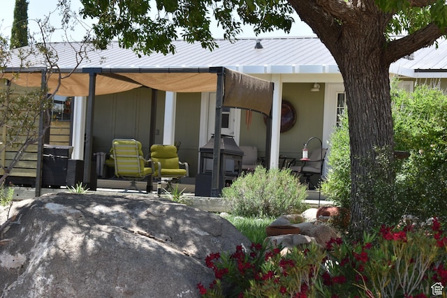 527 S Moenkopi Dr, Leeds, UT 84746 - rear view of property with a patio and metal roof