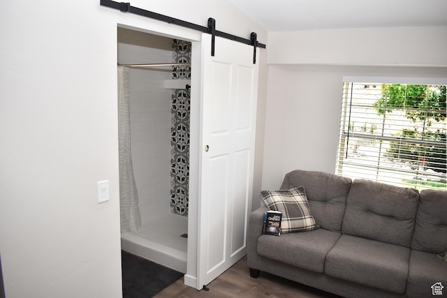 527 S Moenkopi Dr, Leeds, UT 84746 - sitting room featuring a barn door and wood finished floors