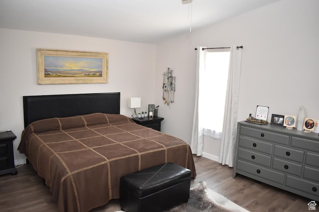 527 S Moenkopi Dr, Leeds, UT 84746 - bedroom featuring dark wood-type flooring and baseboards