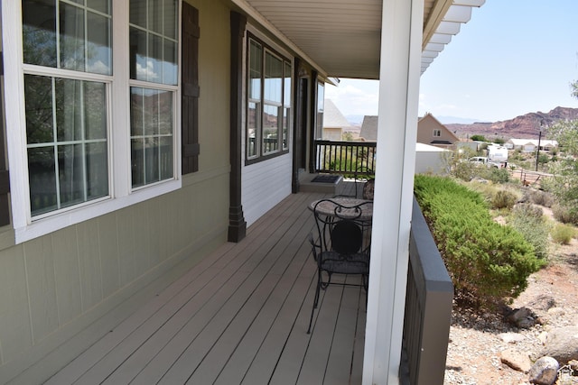 527 S Moenkopi Dr, Leeds, UT 84746 - wooden porch with a mountain view
