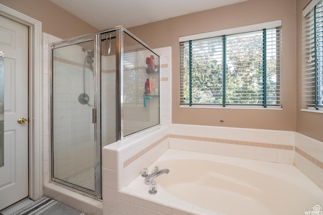 910 W Brandermill Cv, Murray, UT 84123 - full bath with a garden tub, a shower stall, and plenty of natural light